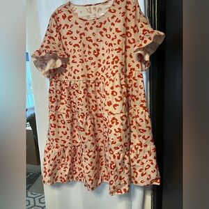 Cute leopard print dress with stacked detail.